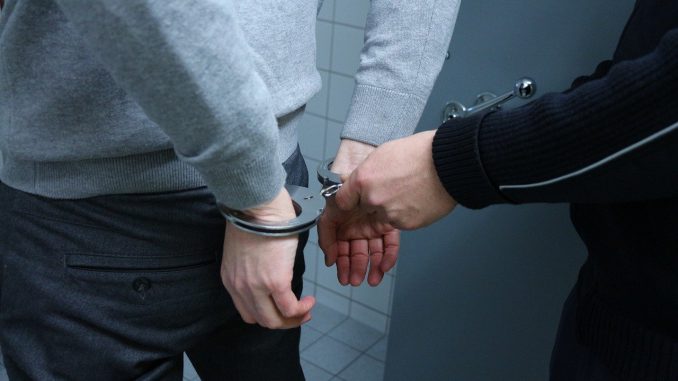 Police Arrest Handcuffs Offender 