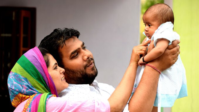 Family Couple Daughter Happy  - balouriarajesh / Pixabay