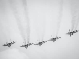 four fighter planes in mid air