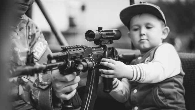Boy Child Portrait Military Weapon Boy Child Portrait Military Weapon - DariuszSankowski / Pixabay