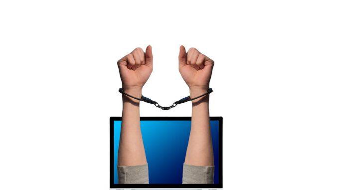 Crime Handcuffs Laptop Cyber Crime  - geralt / Pixabay