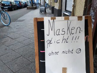 Hinweis auf Maskenpflicht, über dts Nachrichtenagentur