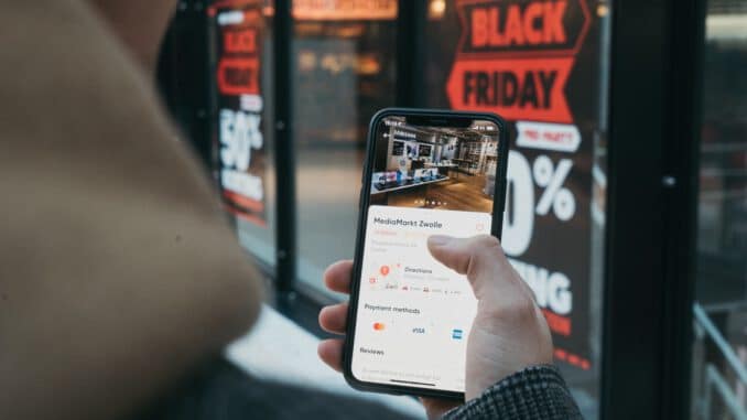 person holding black samsung android smartphone