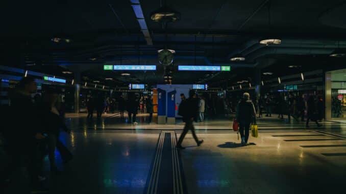 group of people walking inside building