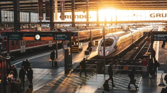 people walking on train station during daytime